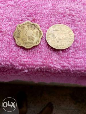 Golden colour 10 paisa and 20 paisa coin of year