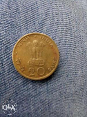 Indian 20 paise  coin inside sun and lots