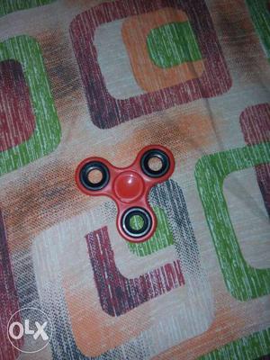 New red fidget spinner.smooth and perfect
