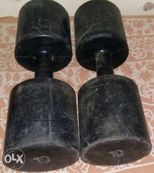 Pair of rubberized 10 kg each unused dumbles for