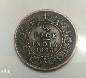 Round Black And Brown 1/2 Pice Indian  Coin