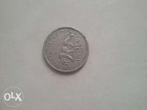 Round British India coin half Rupees
