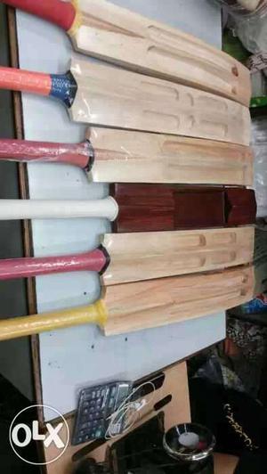 Six Brown Wooden Cricket Mallets