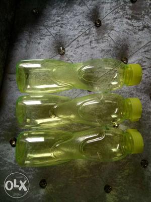 Three Yellow Plastic Bottle