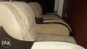 Two Beige Suede Sofa Chairs