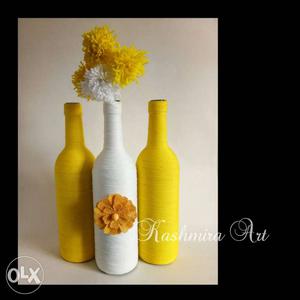 Two yellow and one white bottle combination with