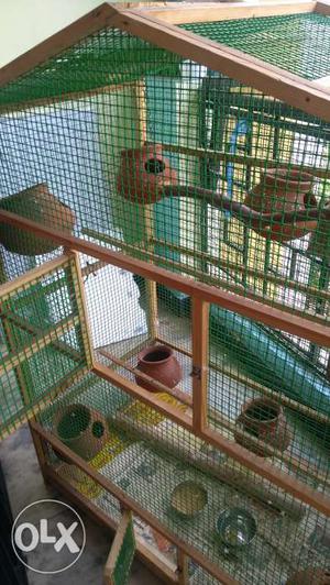 Bird Cage of 4feet of 3feet with 10 pots inside.