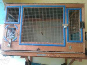 Brown And Blue Painted Animal Cage