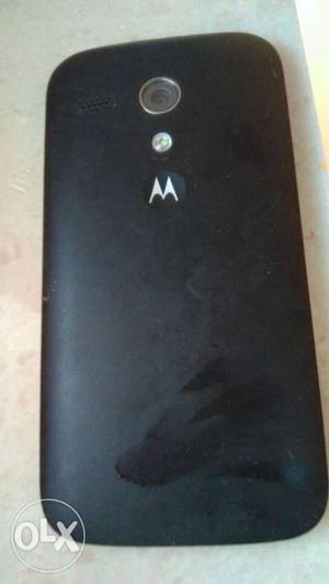 Moto G with charger, in very good condition