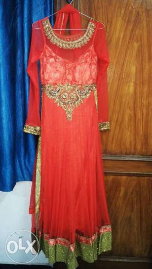Beautiful floor length suit. Tomato red colour