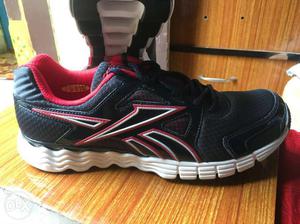 Black,red,and White Reebok Running Shoes