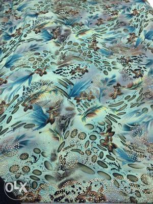 Blue And Multicolored Floral Textile