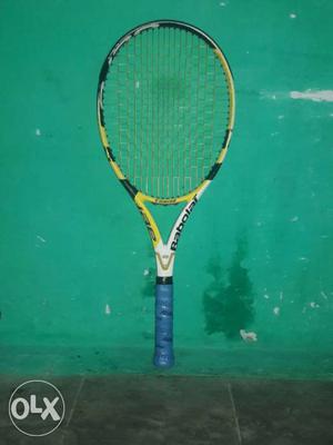 Blue And Yellow Tennis Racket