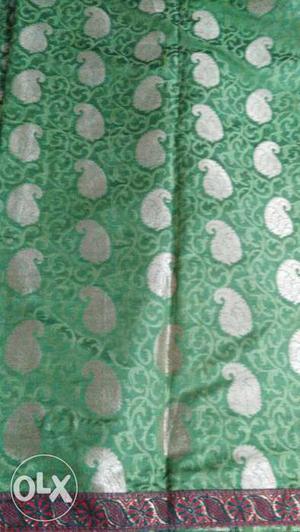 Green And Silver Paisley Print Textle