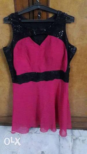 Magenta color knee length dress. used 1 2 times.