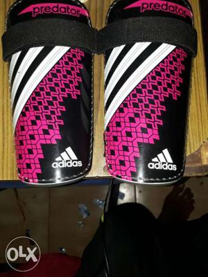 Pair Of Black-white-pink Adidas Knee Pads
