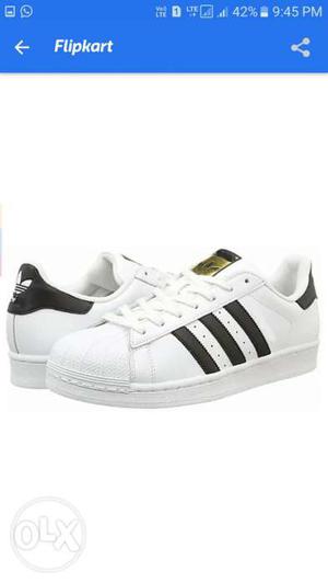 Pair Of White Adidas Sneaker