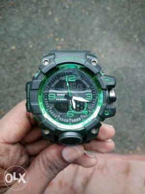 Round Black And Green Casio G-Shock Watch