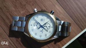 Round Gold-colored And Silver-colored Chronograph taguear