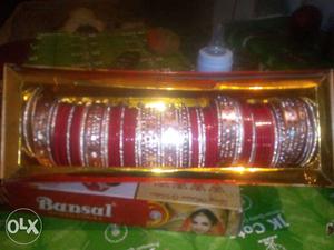 Silver-colored And Red Bangles Lot