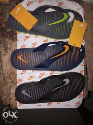 Three Nike Flip Flops stok for sale