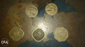 Two 25, Two 5, And One 10 Indian Paise Coins
