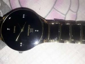 Watch black,goldin colour quartz company new watch