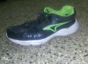 Black And Green Athletic Shoe