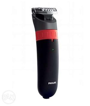 Black And Red Philips Electric Shaver