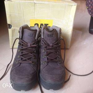Black-and-brown branded Caterpillar Combat Boots With Box