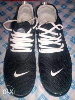 Pair Of Black Nike Rosherun