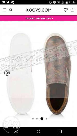 Pair Of Brown Slip On Shoes