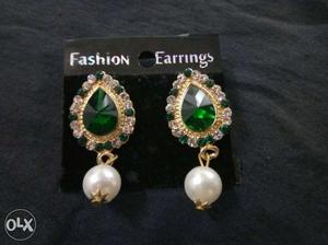 Pair Of Gold Emerald Earrings