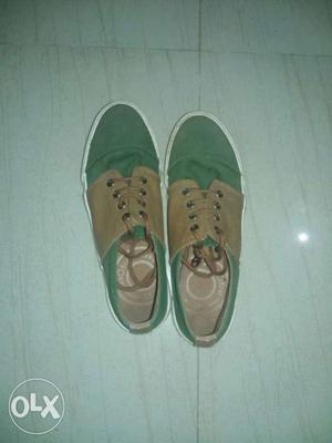 Pair Of Green-and-brown Low Top Sneakers