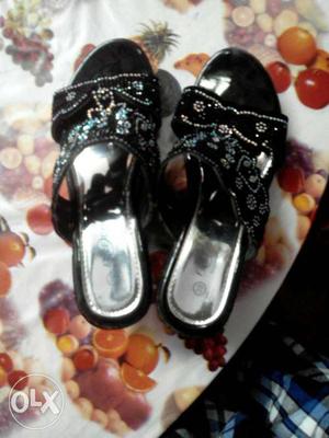 Pair Of Women's Black And Silver Sandals