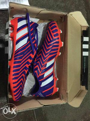 Paired Red-and-purple Adidas Cleats