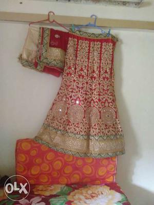 Red and golden chaniya choli new and unstictch