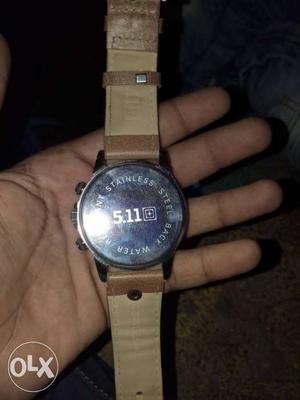 Stainless Steel Watch With Brown And Beige Strap