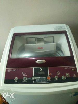 White And Red Whirlpool Top Load Washing machine