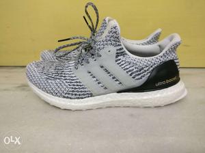 White-and-gray Adidas Ultra Boost's