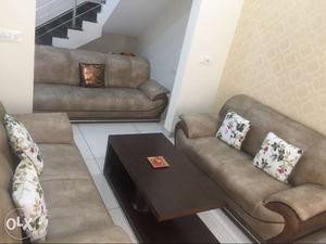 9 seater sofa with centre table. excellent
