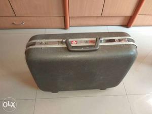 Black VIP Hardshell Suitcase in good condition
