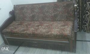 Black Wooden Framed Gray And Brown Fabric Sofa