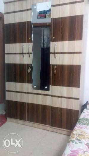 Brown And Beige Wood-framed Wardrobe With Mirror