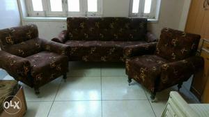 Brown Cushion Couch And Two Armchairs