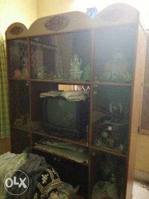 Brown Wooden Entertainment Center With CRT Television
