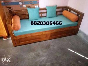 Brown Wooden Framed Green Fabric Daybed