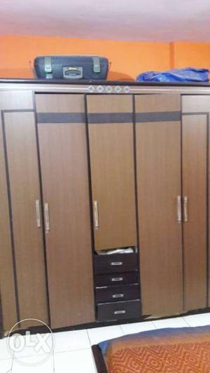 Brown mdf ply wardrobe with double bed and Dressing table..