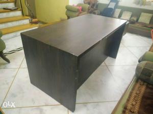 Custom-made dark brown wooden desk