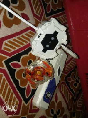 Orange And Clear Plastic Beyblade Toy